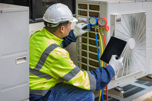 Professional Ac Installation technician working in Newport, OR